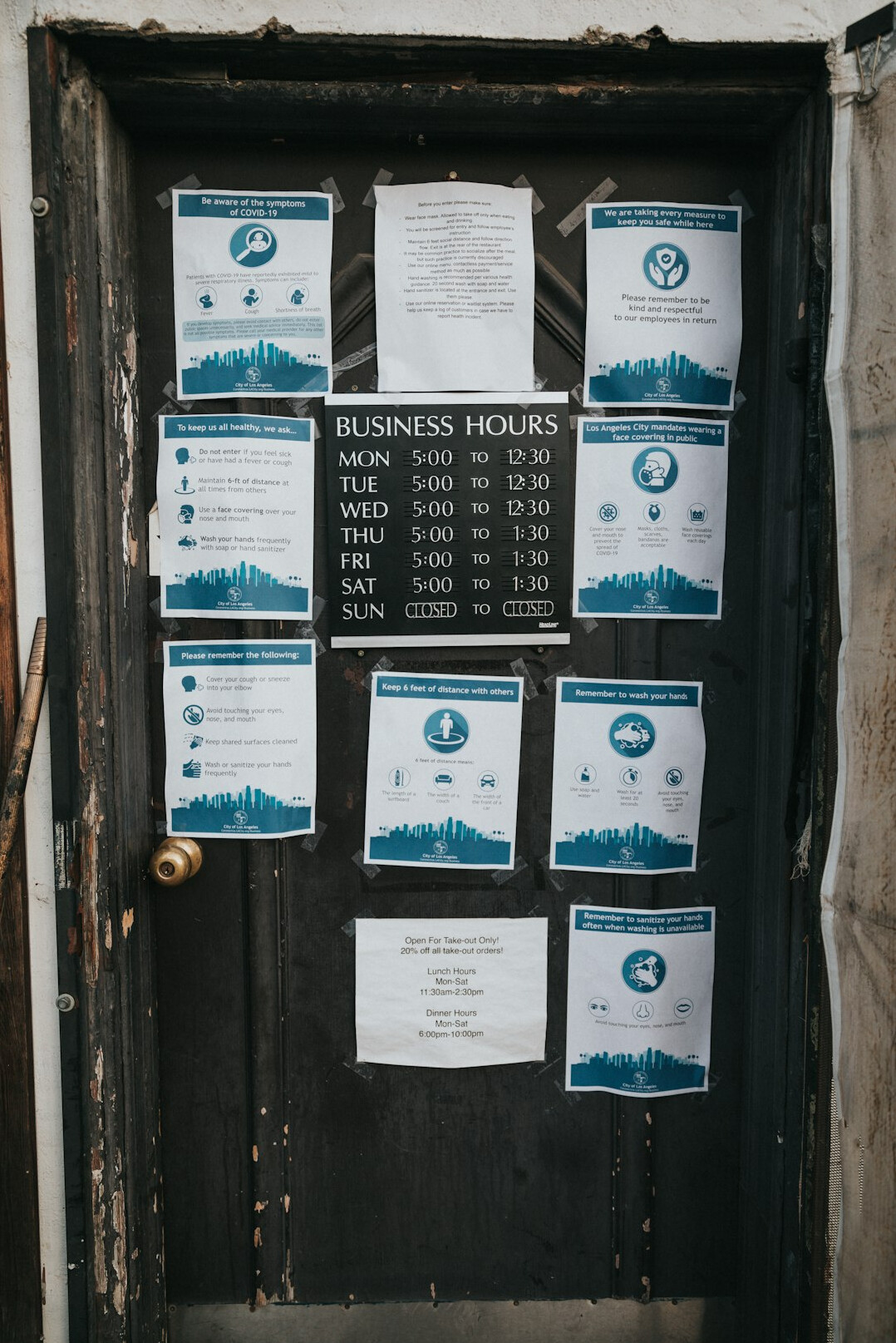 Hands holding business documents with charts at a desk