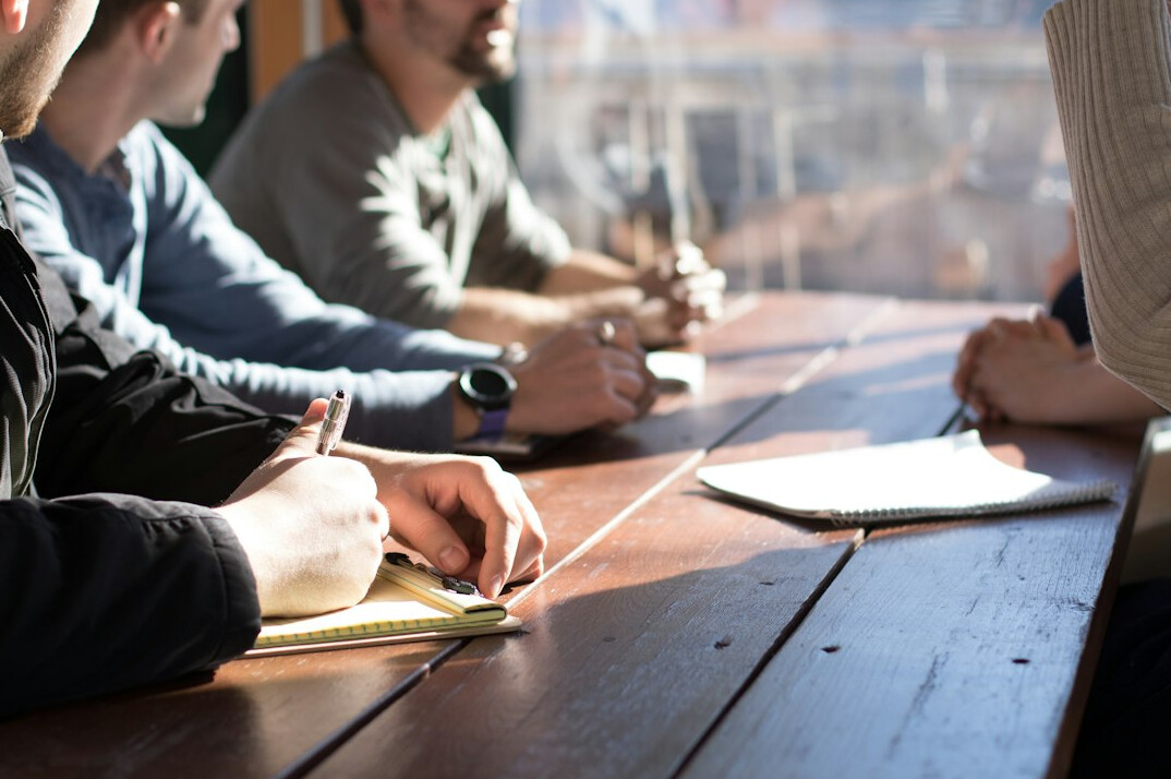 business leader in meeting