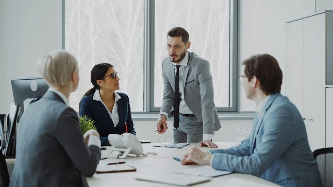 business leader in meeting
