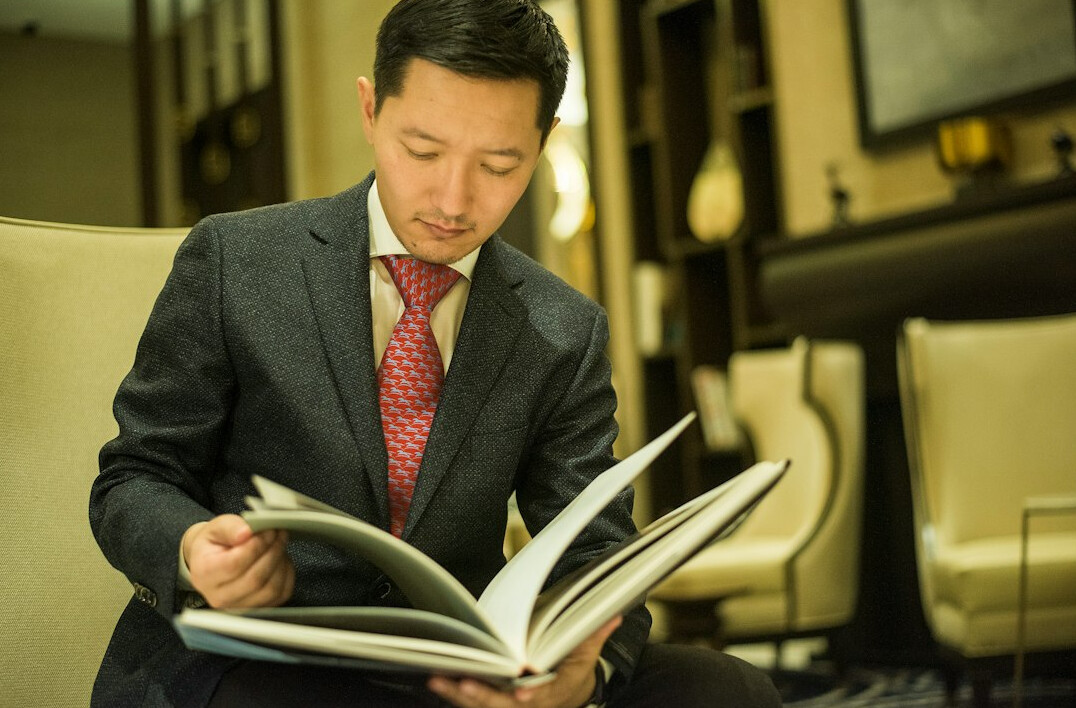 entrepreneur studying business book
